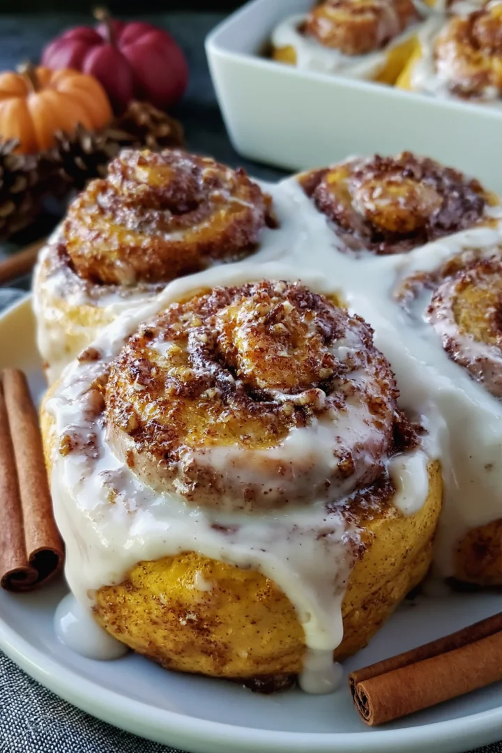 Perfect Pumpkin Cinnamon Rolls with Maple Cream Cheese Icing